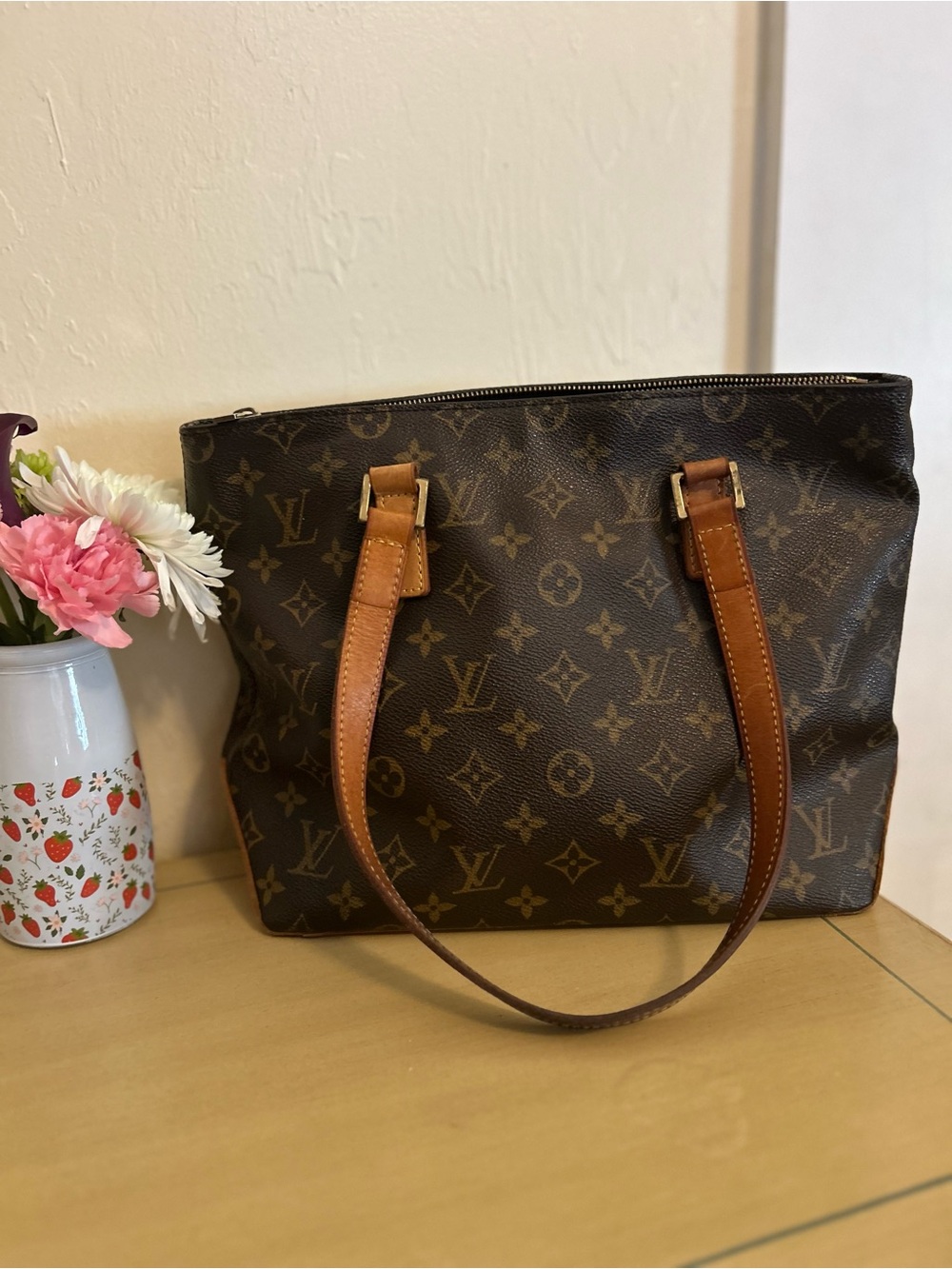 Vintage authentic Louis Vuitton Monogram Canvas piano Tote with Cognac Straps.